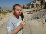 Enjoying a banana while working in a pueblo in Arequipa, Peru
